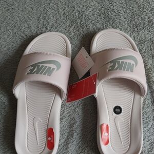 Nike Women’s Pink Slide Sandals